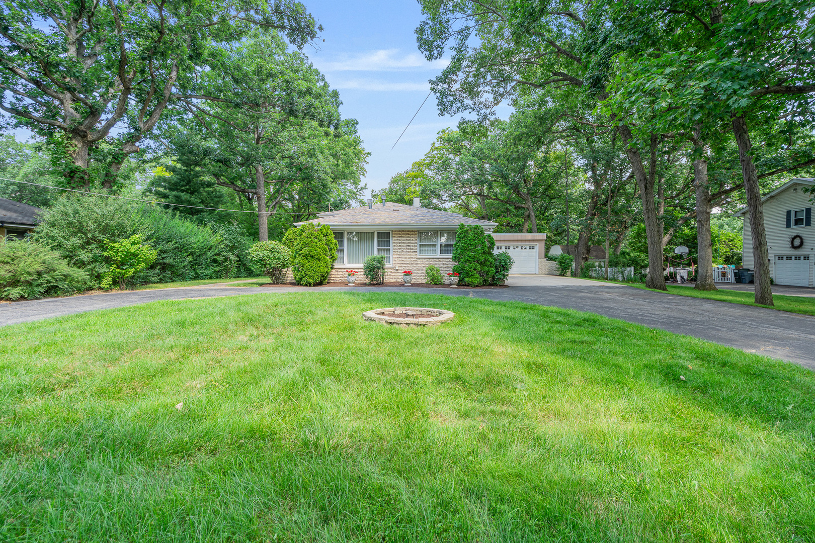11-s047 Palisades Road Burr Ridge, IL 60527 - Photo 54 of 63 a view of a house with a yard porch and sitting area