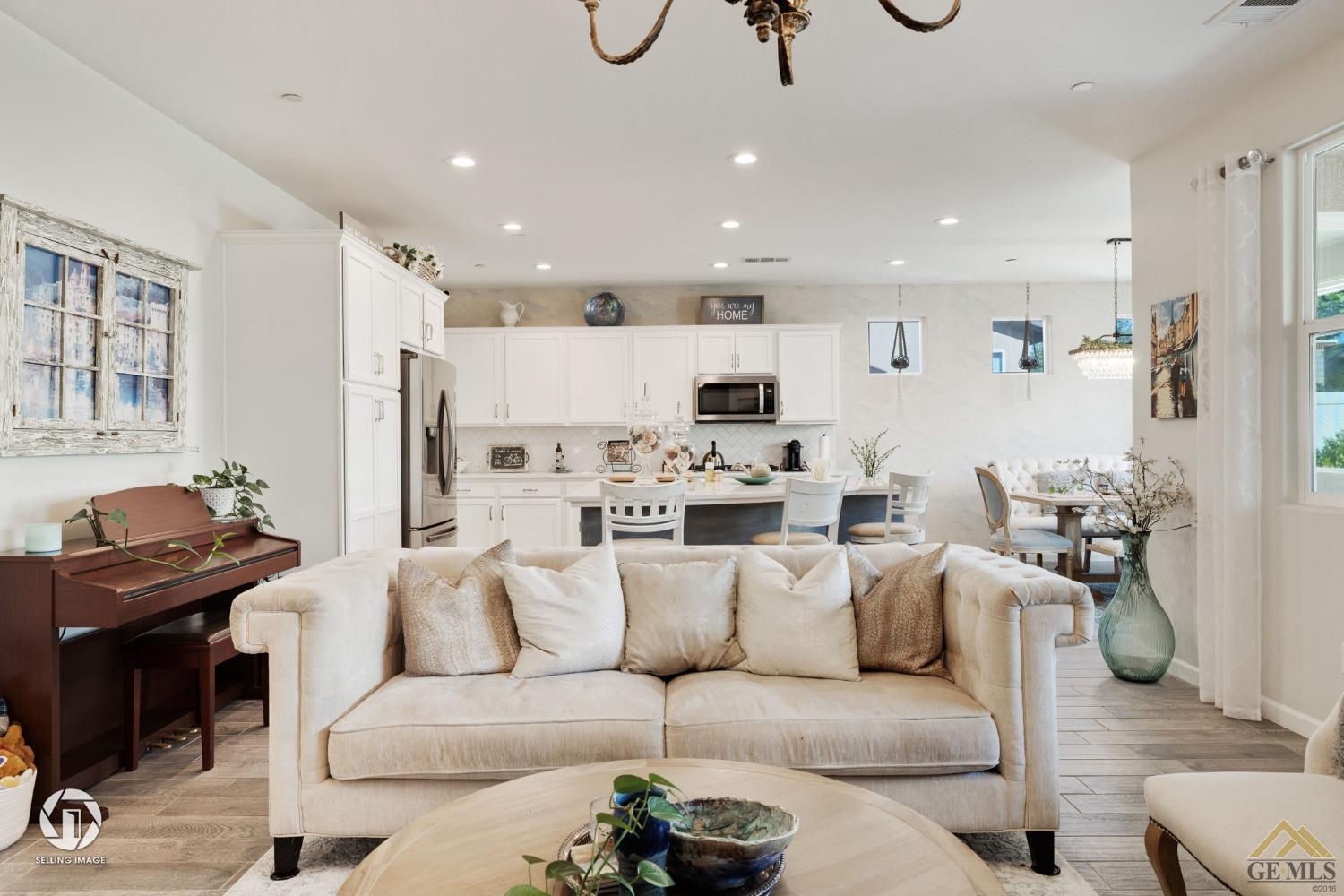 Undisclosed Address Bakersfield, CA 93311 - Photo 16 of 49 a living room with furniture and a view