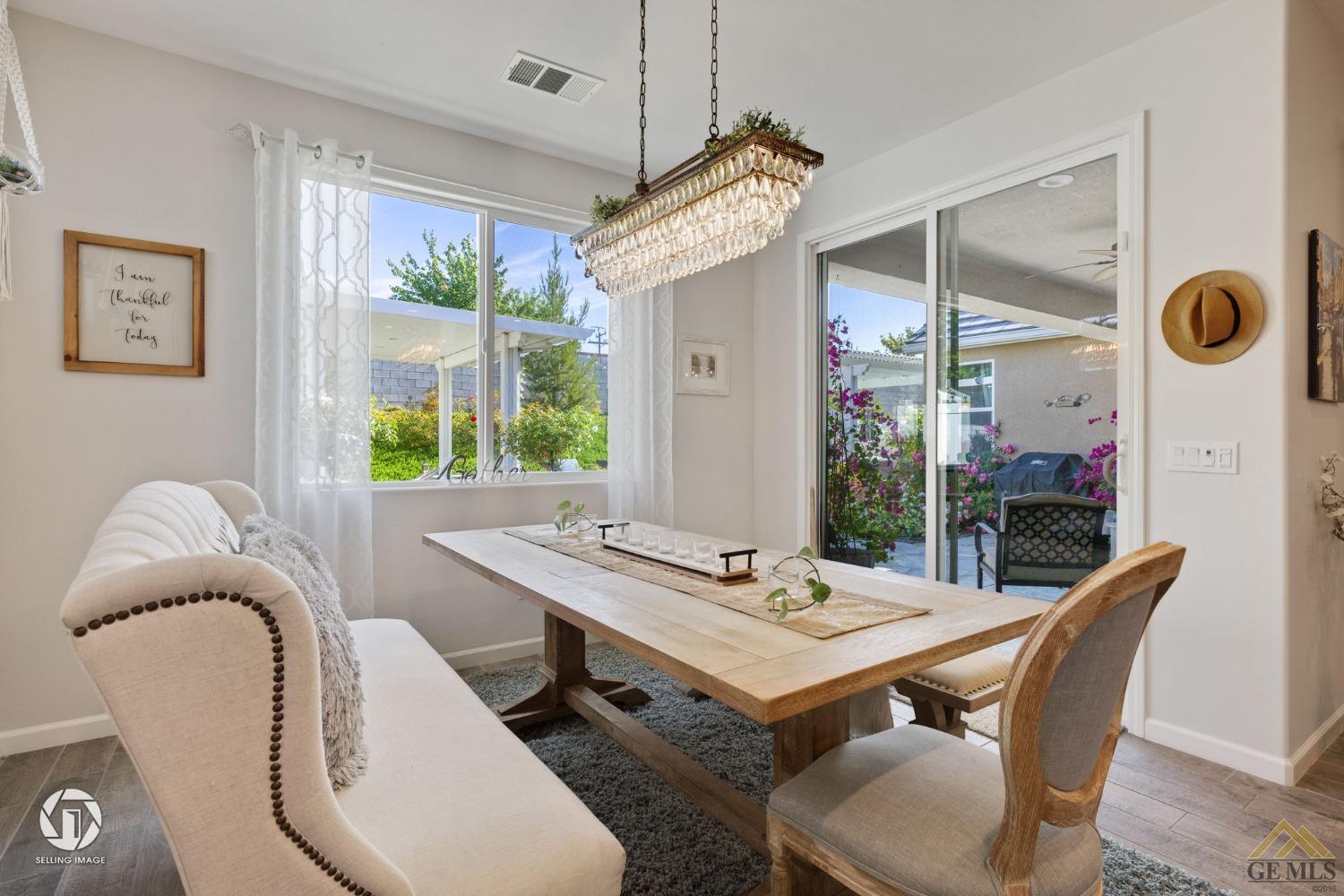 Undisclosed Address Bakersfield, CA 93311 - Photo 24 of 49 a view of a dining room with furniture window and outside view