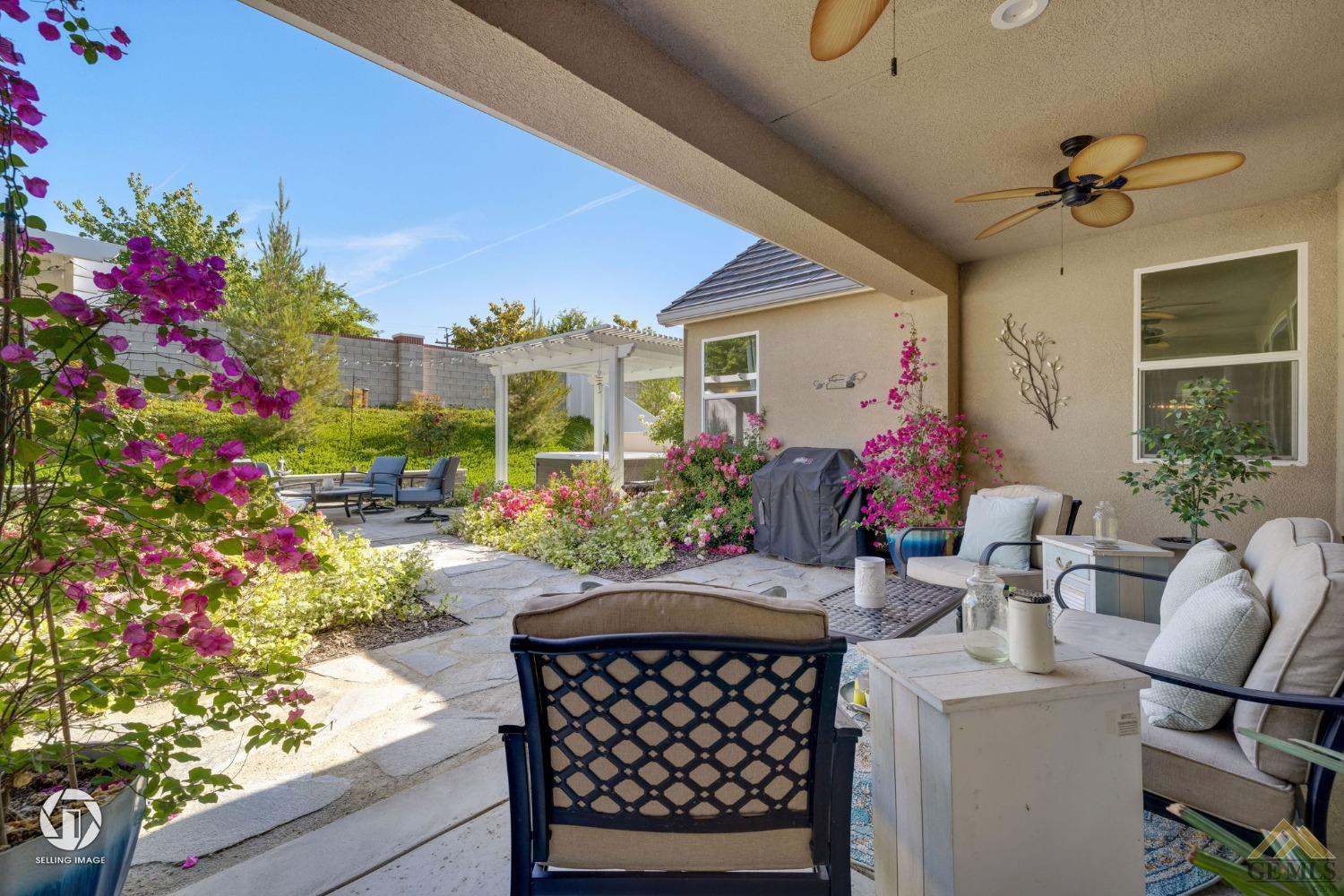 Undisclosed Address Bakersfield, CA 93311 - Photo 39 of 49 a view of a chairs and table in a patio