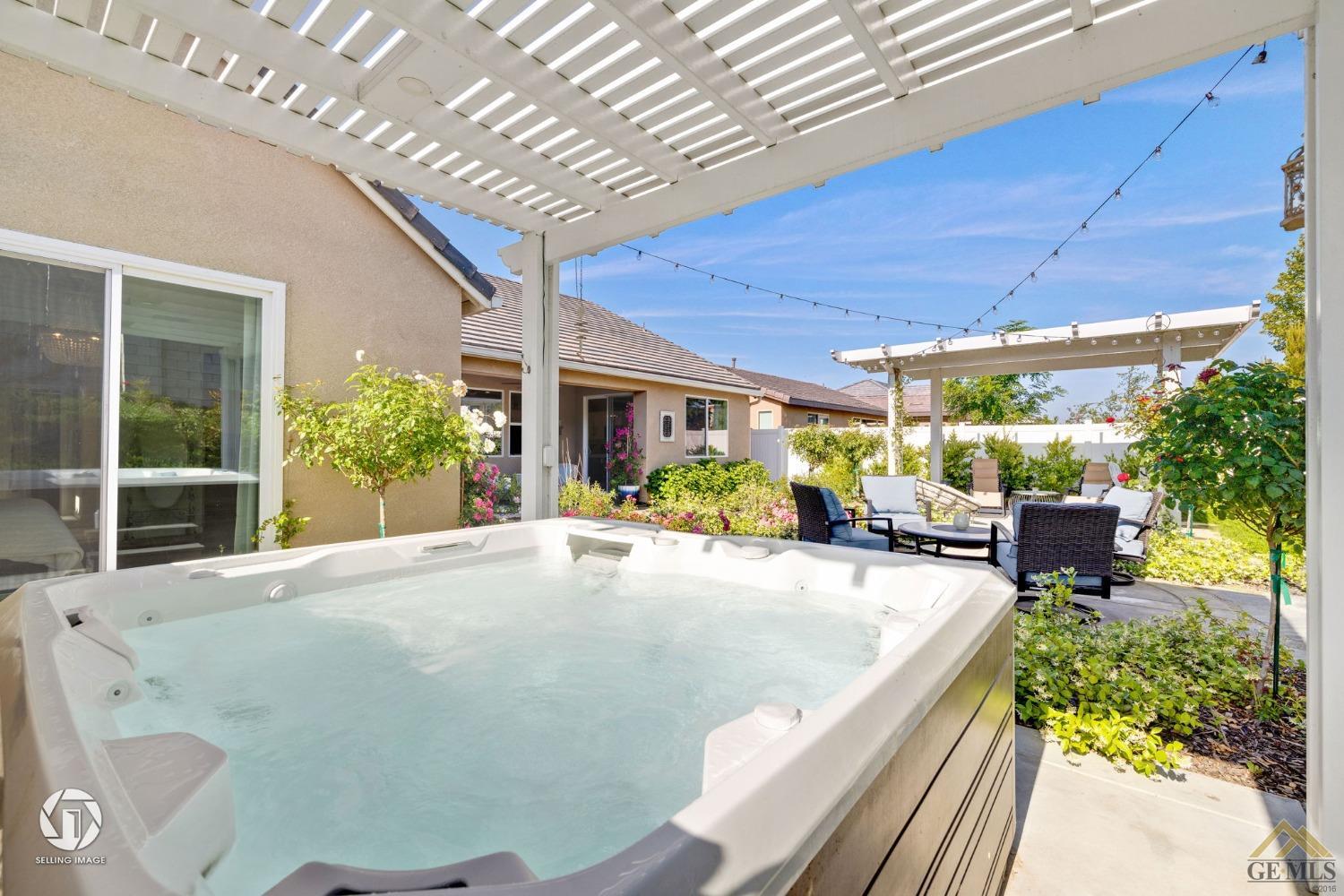 Undisclosed Address Bakersfield, CA 93311 - Photo 45 of 49 a view of a backyard with garden and patio