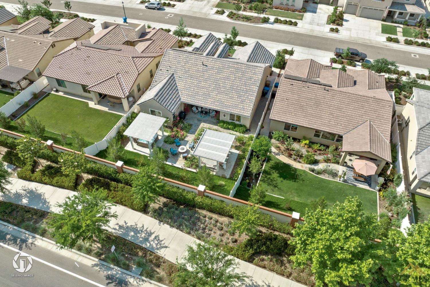 Undisclosed Address Bakersfield, CA 93311 - Photo 47 of 49 an aerial view of residential houses with outdoor space and street view