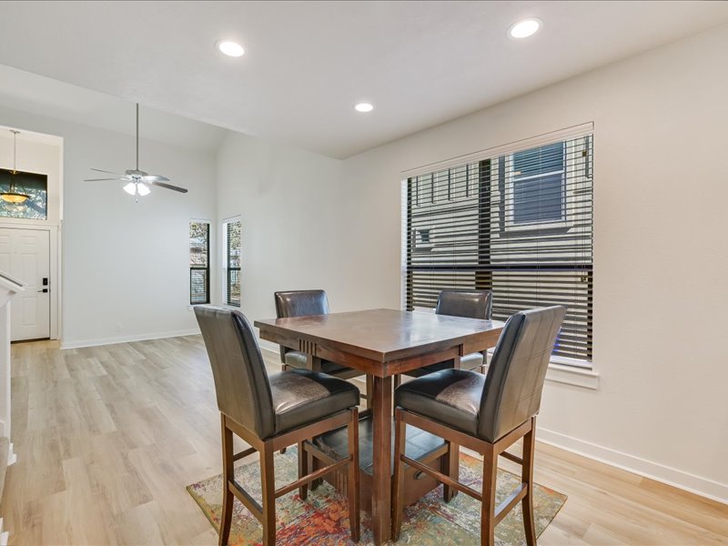 2101 Rivers Edge Way, Unit 29 Austin, TX 78741 - Photo 11 of 34 a view of a dining room with furniture