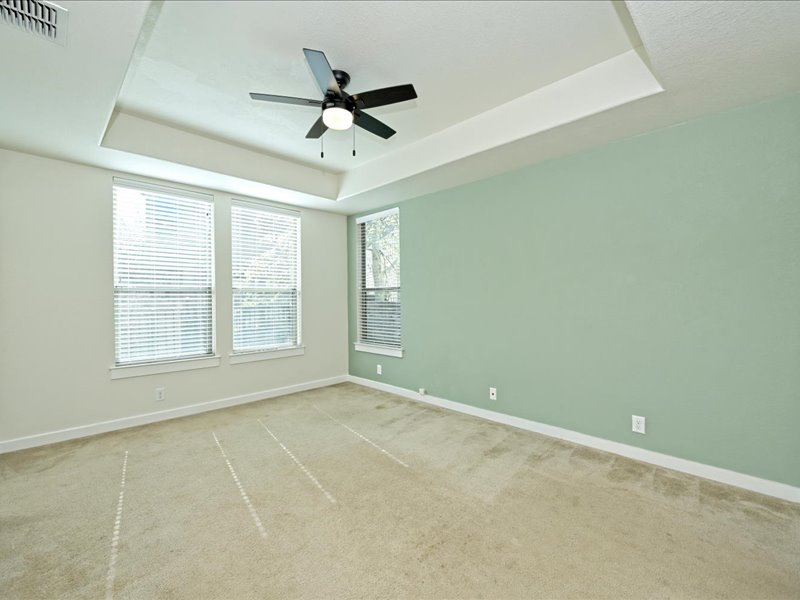 2101 Rivers Edge Way, Unit 29 Austin, TX 78741 - Photo 13 of 34 a view of an empty room with a window