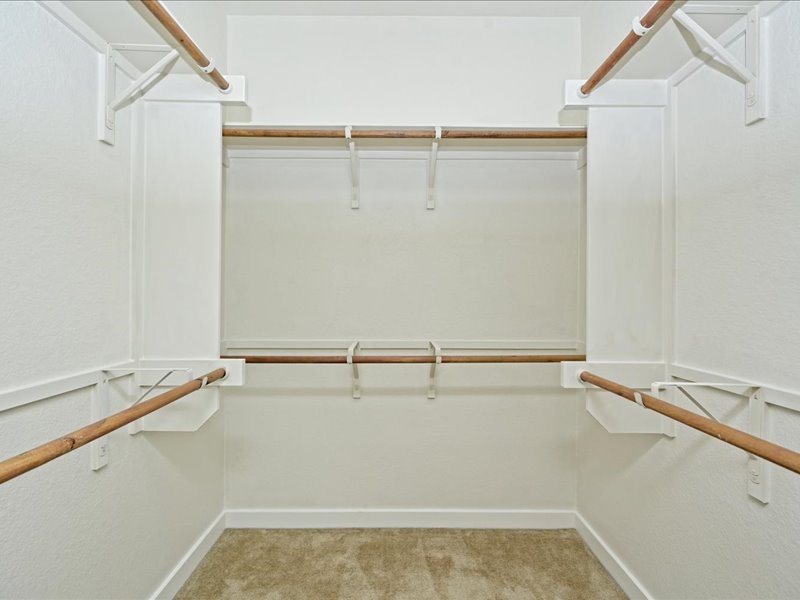 2101 Rivers Edge Way, Unit 29 Austin, TX 78741 - Photo 16 of 34 a view of a room with racks on the wall