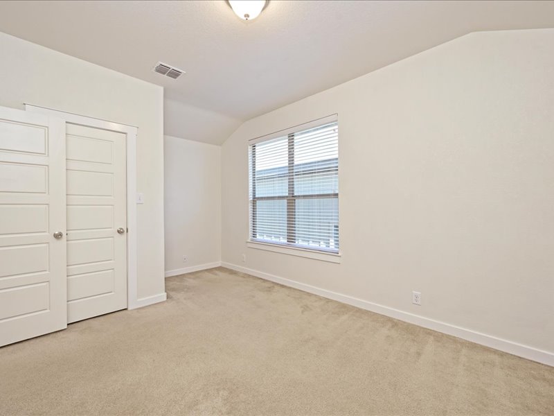 2101 Rivers Edge Way, Unit 29 Austin, TX 78741 - Photo 25 of 34 an empty room with windows