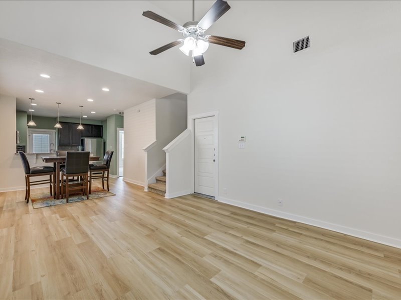 2101 Rivers Edge Way, Unit 29 Austin, TX 78741 - Photo 4 of 34 a view of work space with furniture and wooden floor