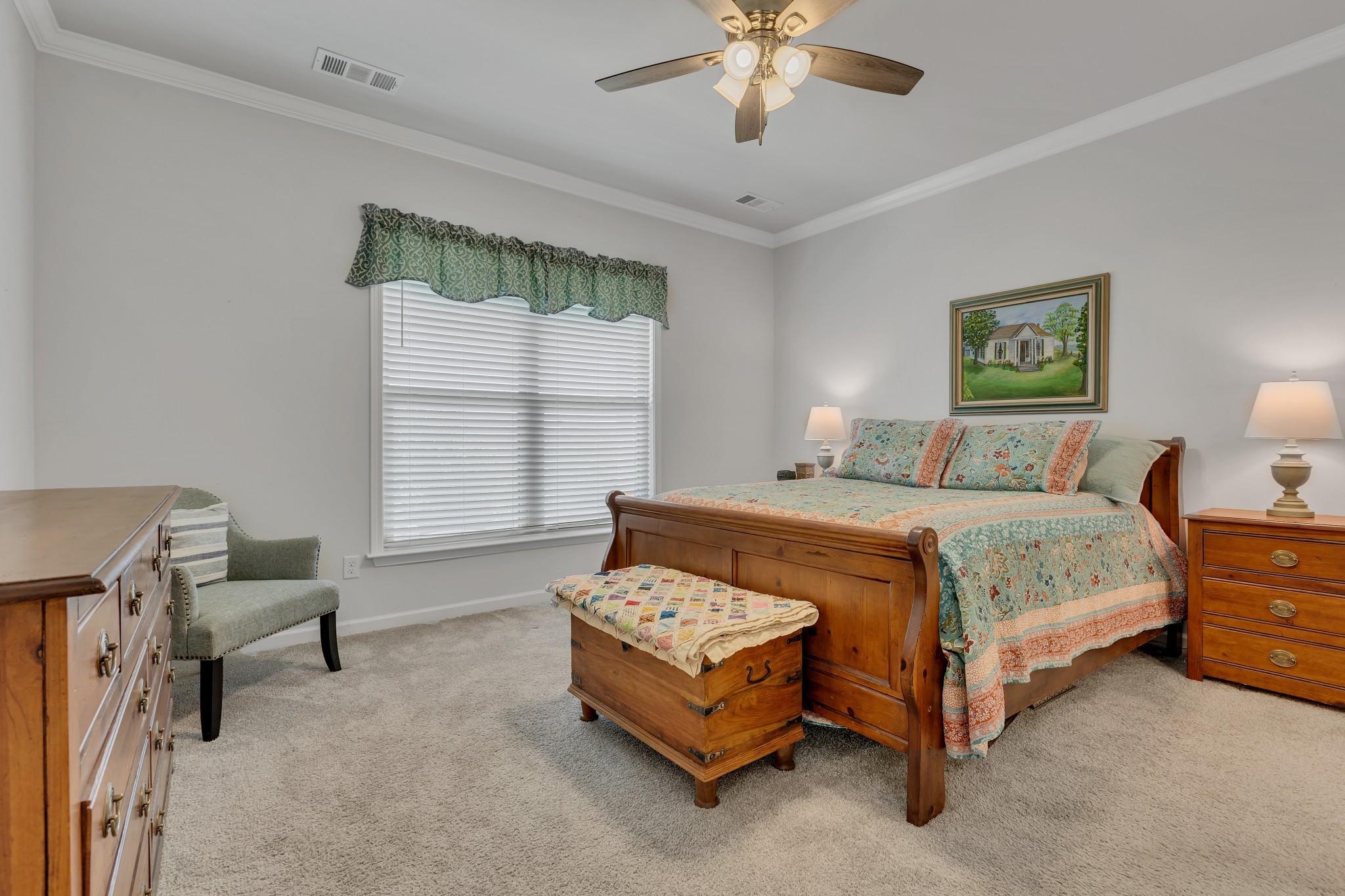 1514 Bledsoe Knoll Spring Hill, TN 37174 - Photo 18 of 47 a bedroom with a bed and a chandelier
