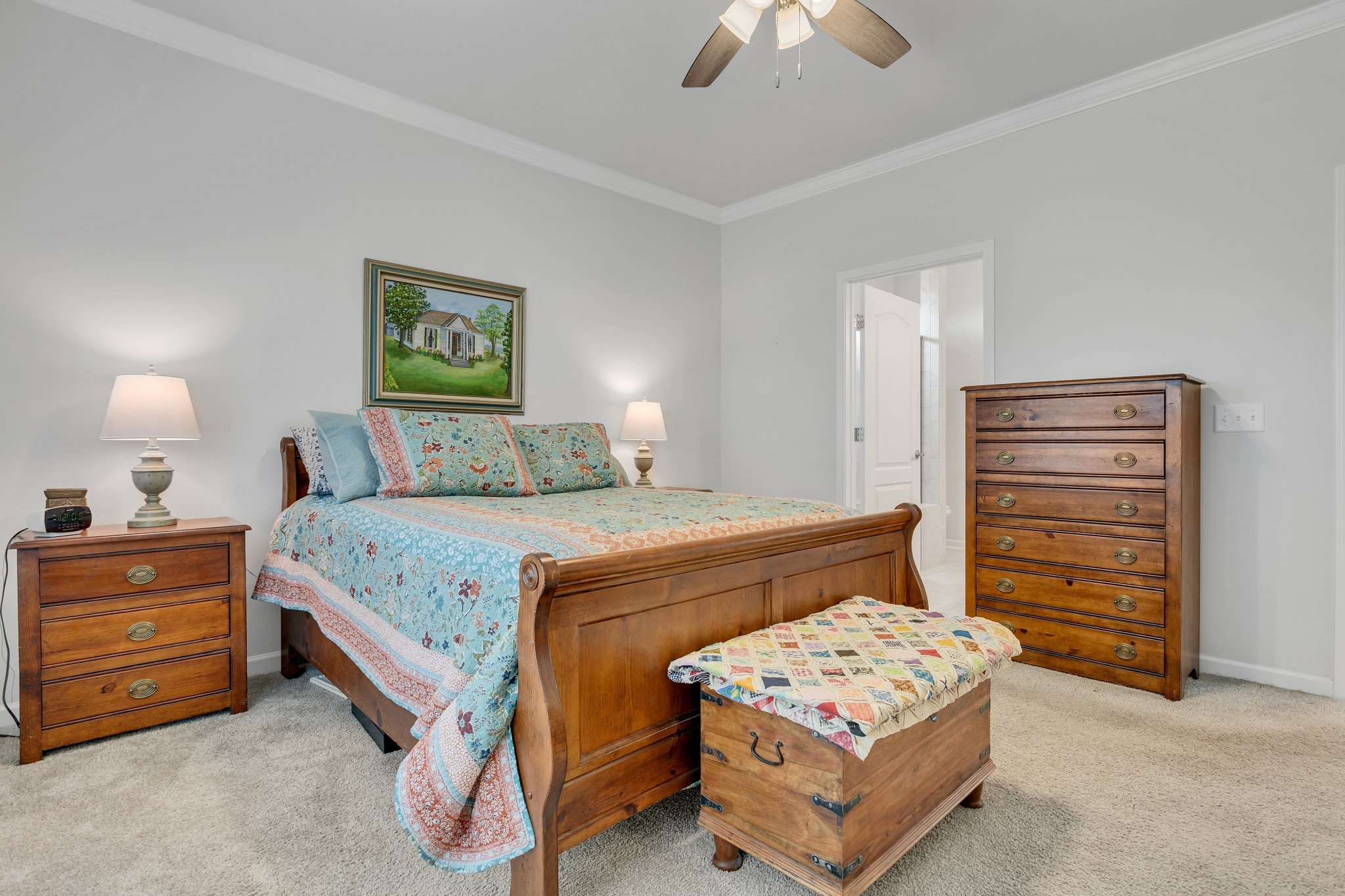 1514 Bledsoe Knoll Spring Hill, TN 37174 - Photo 19 of 47 a bedroom with a bed and a chandelier