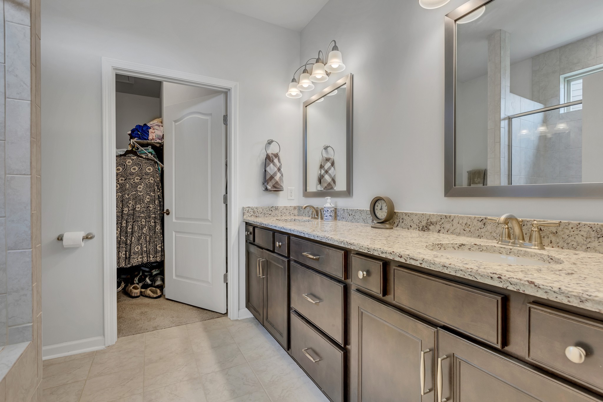 1514 Bledsoe Knoll Spring Hill, TN 37174 - Photo 21 of 47 a bathroom with a granite countertop sink and a mirror