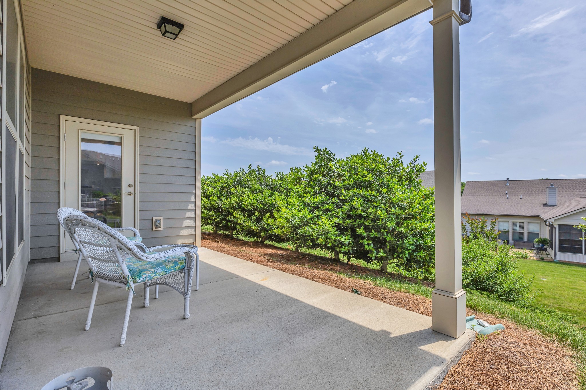 1514 Bledsoe Knoll Spring Hill, TN 37174 - Photo 26 of 47 a view of a patio with table and chairs and potted plants