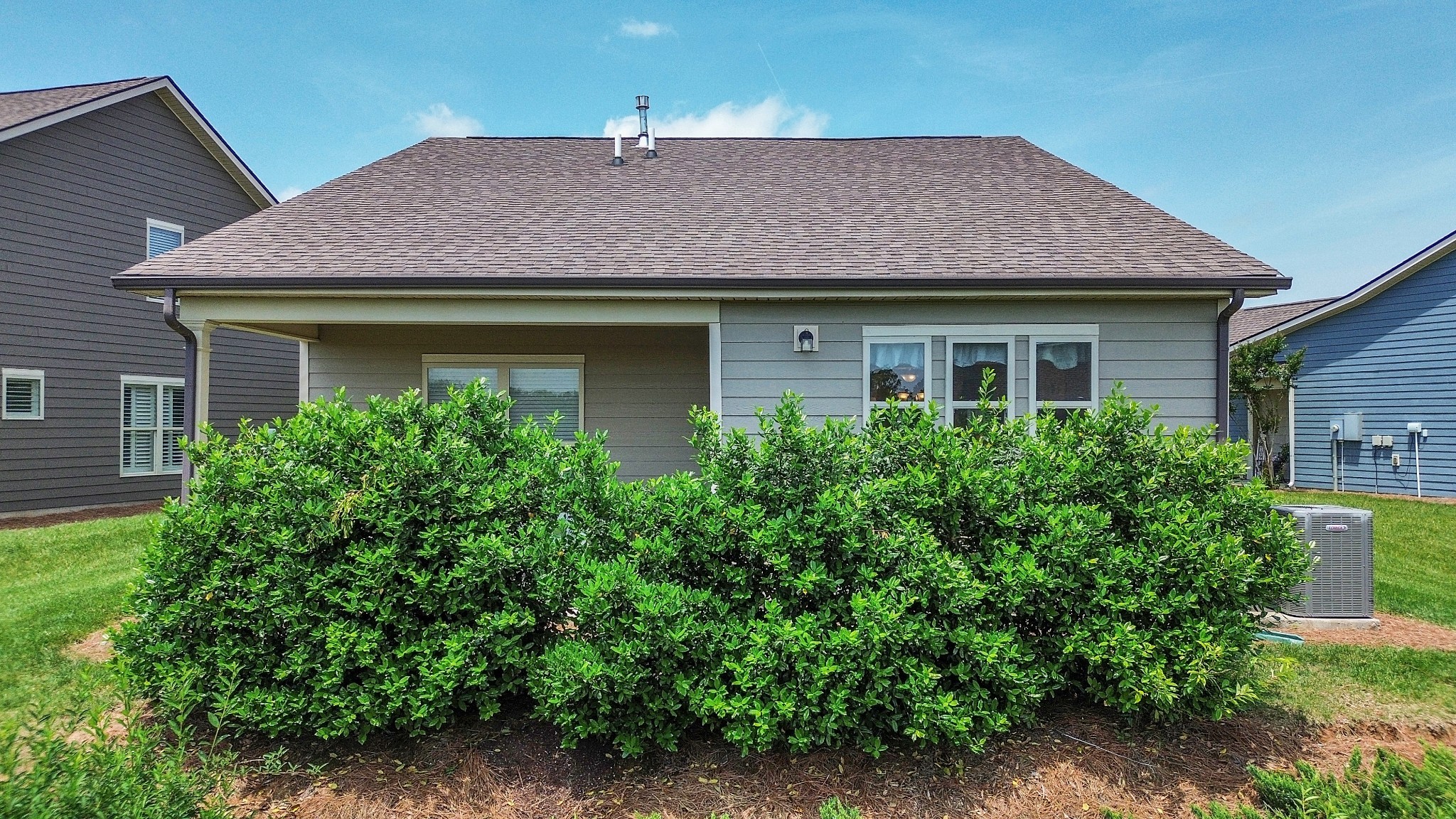 1514 Bledsoe Knoll Spring Hill, TN 37174 - Photo 29 of 47 a front view of a house with a yard