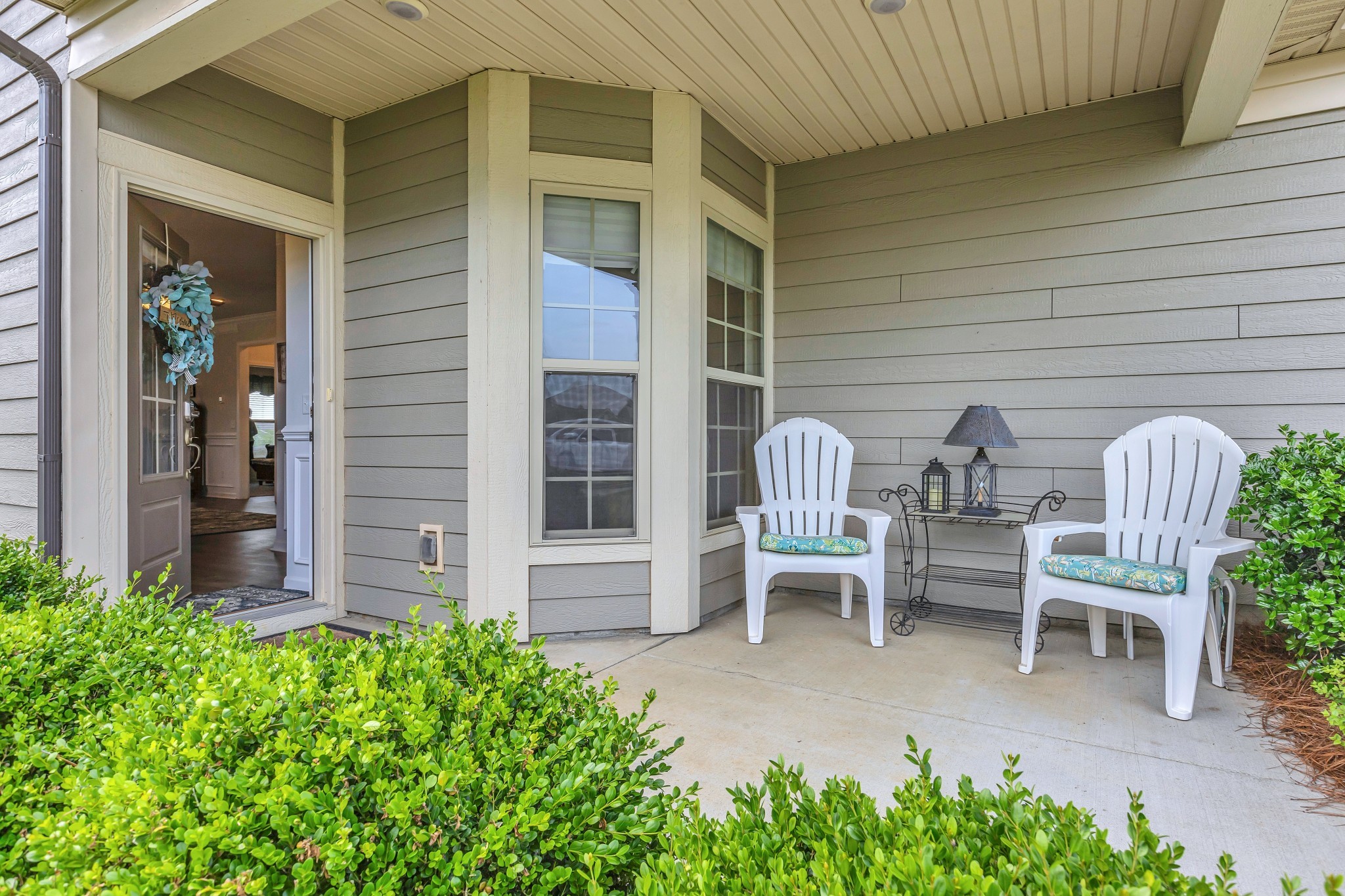 1514 Bledsoe Knoll Spring Hill, TN 37174 - Photo 4 of 47 a front view of a house with outdoor seating