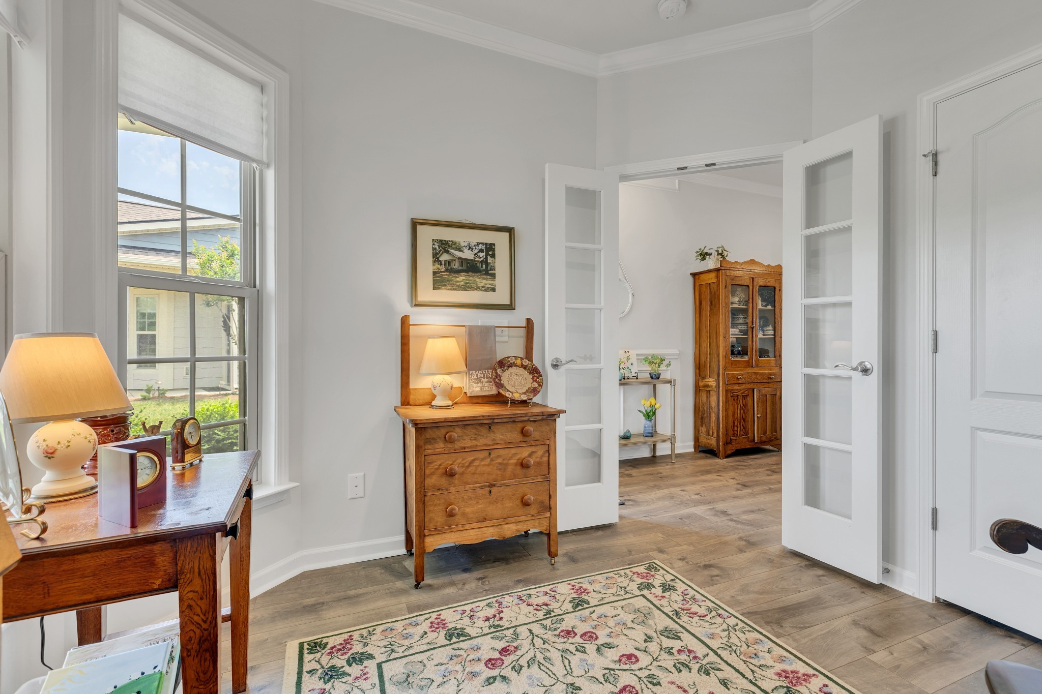 1514 Bledsoe Knoll Spring Hill, TN 37174 - Photo 7 of 47 a living room with furniture and a dresser