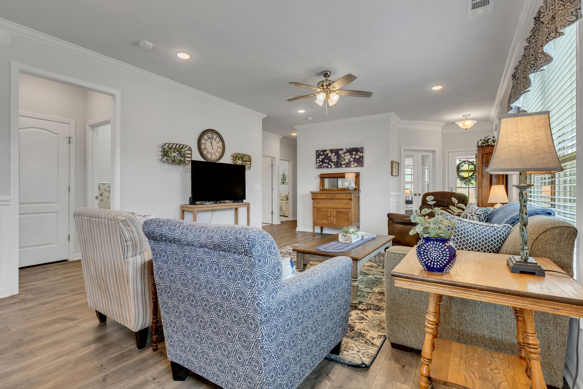 1514 Bledsoe Knoll Spring Hill, TN 37174 - Photo 9 of 47 a living room with furniture and a flat screen tv