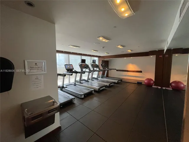 a view of a room with gym equipment