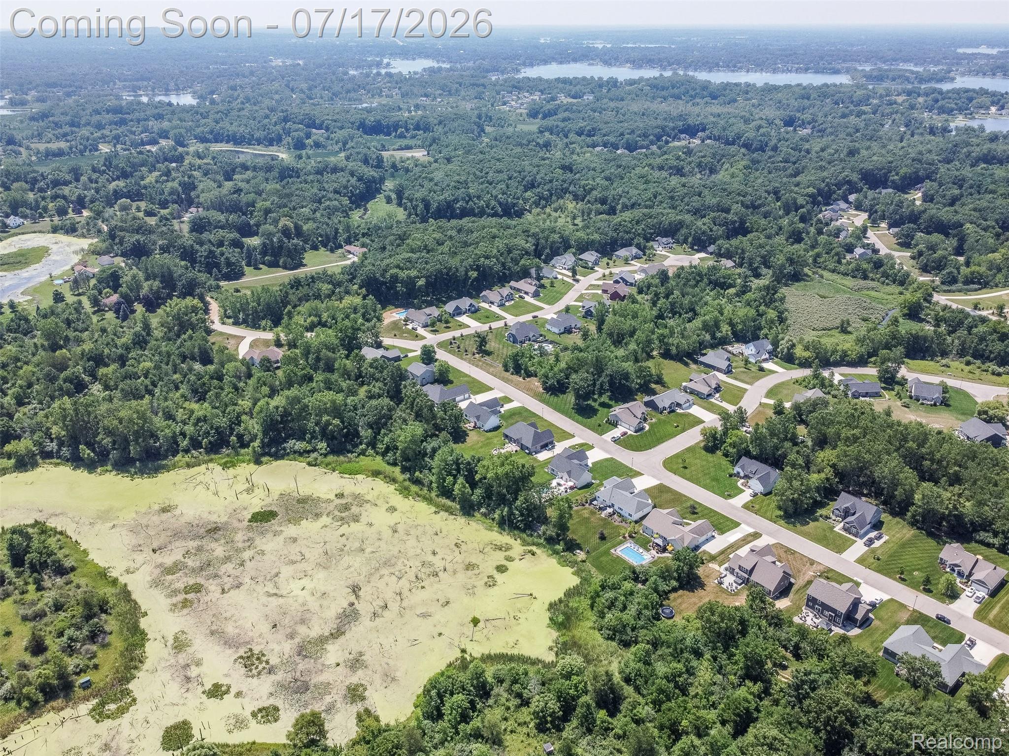 12349 Sugar Maple Drive Fenton, MI 48430 - Photo 64 of 67 Residential development featuring a network of paved streets with single-family homes