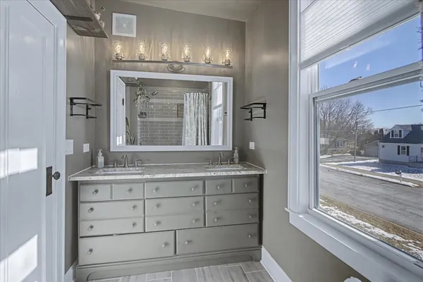 a bathroom with a shower and a bathtub