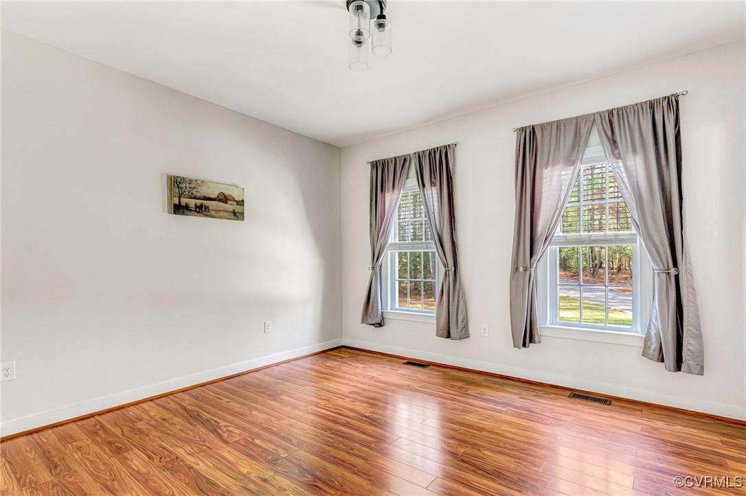 8773 Rock Cedar Road New Kent, VA 23124 - Photo 16 of 37 Dining room with plenty of natural sunlight, wood