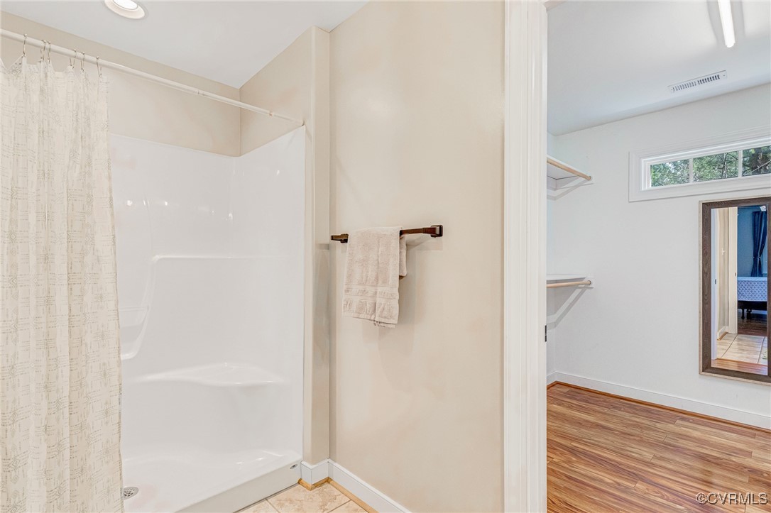 8773 Rock Cedar Road New Kent, VA 23124 - Photo 27 of 37 Primary Full bathroom featuring shower, and cerami
