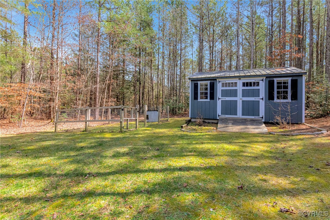 8773 Rock Cedar Road New Kent, VA 23124 - Photo 36 of 37 View of yard featuring an outdoor structure