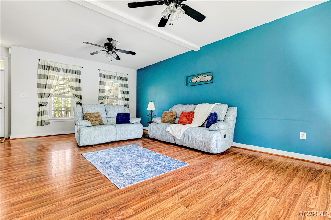 8773 Rock Cedar Road New Kent, VA 23124 - Photo 6 of 37 Family Room featuring wood finished floors, beam c