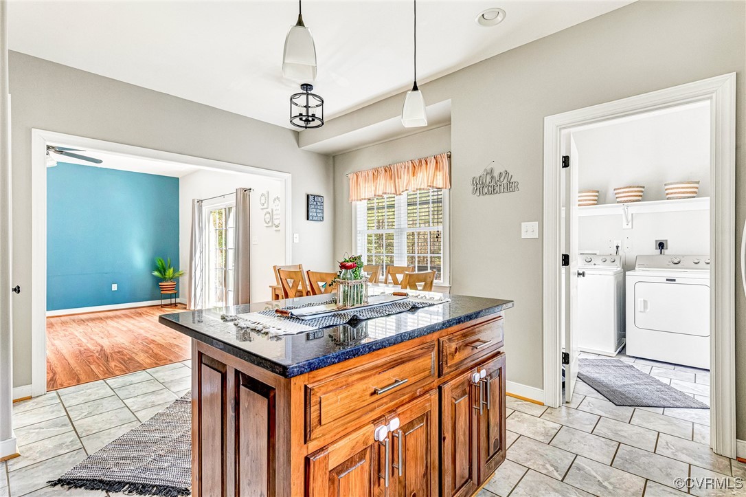 8773 Rock Cedar Road New Kent, VA 23124 - Photo 8 of 37 Kitchen featuring a ceiling fan, brown cabinetry,