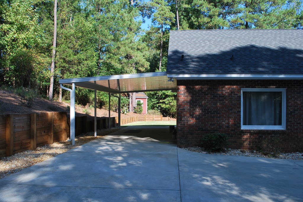 763 Double Churches Road Columbus, GA 31904 - Photo 23 of 26 Rear Carport with Master Bedroom Access