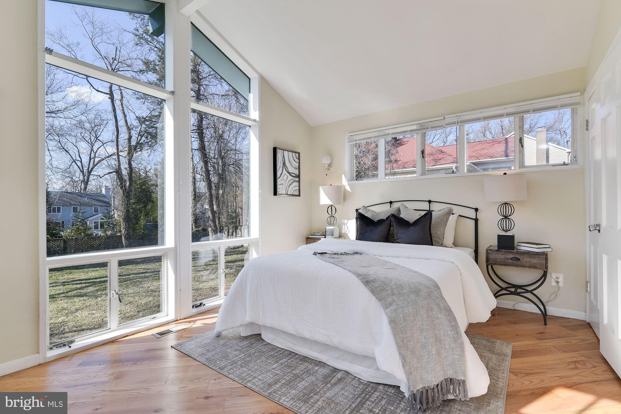 8906 Old Georgetown Road Bethesda, MD 20814 - Photo 19 of 25 Light-filled Primary Bedroom with Vaulted Ceiling