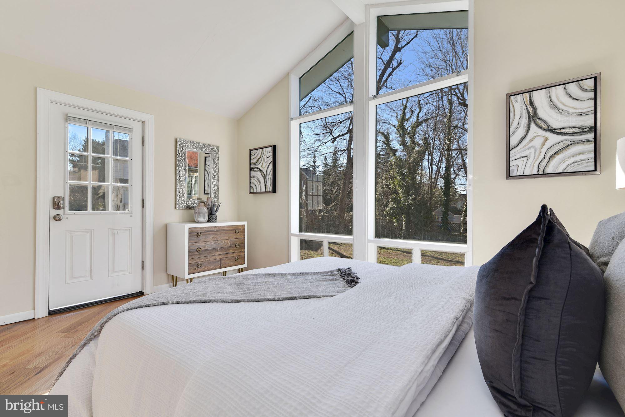 8906 Old Georgetown Road Bethesda, MD 20814 - Photo 20 of 25 Light-filled Primary Bedroom with Vaulted Ceiling