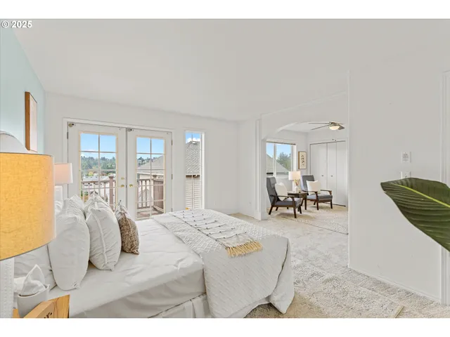 a bedroom with furniture and a two chair