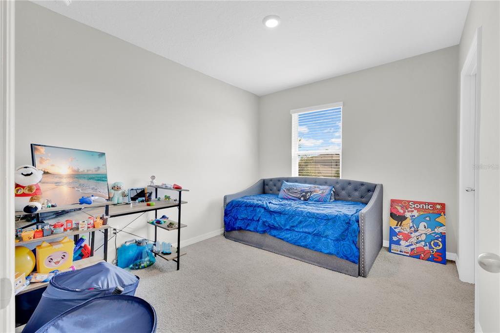 167 Eagleview Loop Davenport, FL 33837 - Photo 17 of 39 a living room with furniture