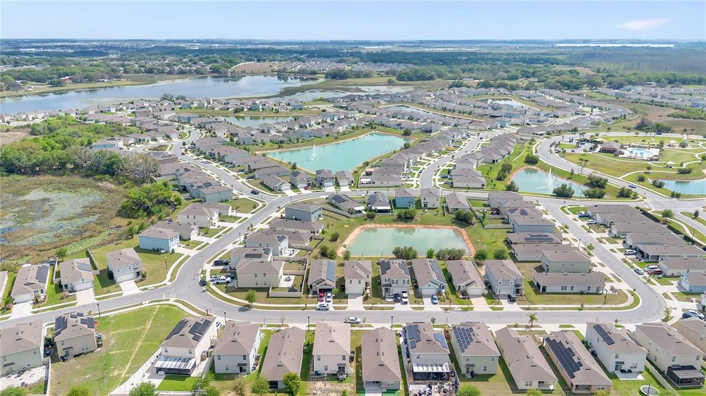 167 Eagleview Loop Davenport, FL 33837 - Photo 28 of 39 a view of building with outdoor space