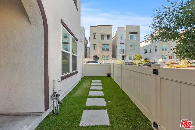 a backyard with stove and garden