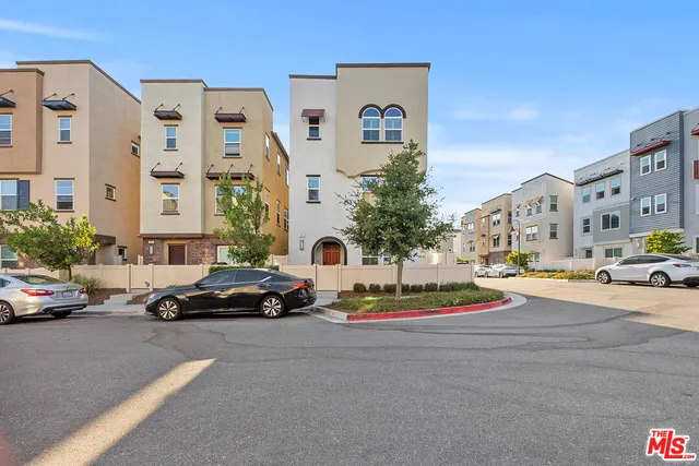 a cars parked in front of a building