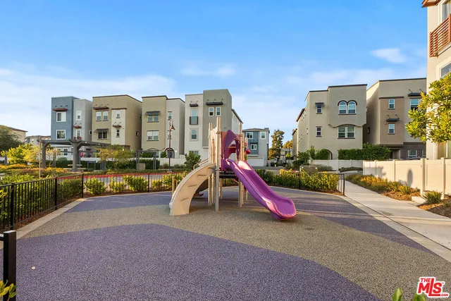 a view of a city with tall buildings