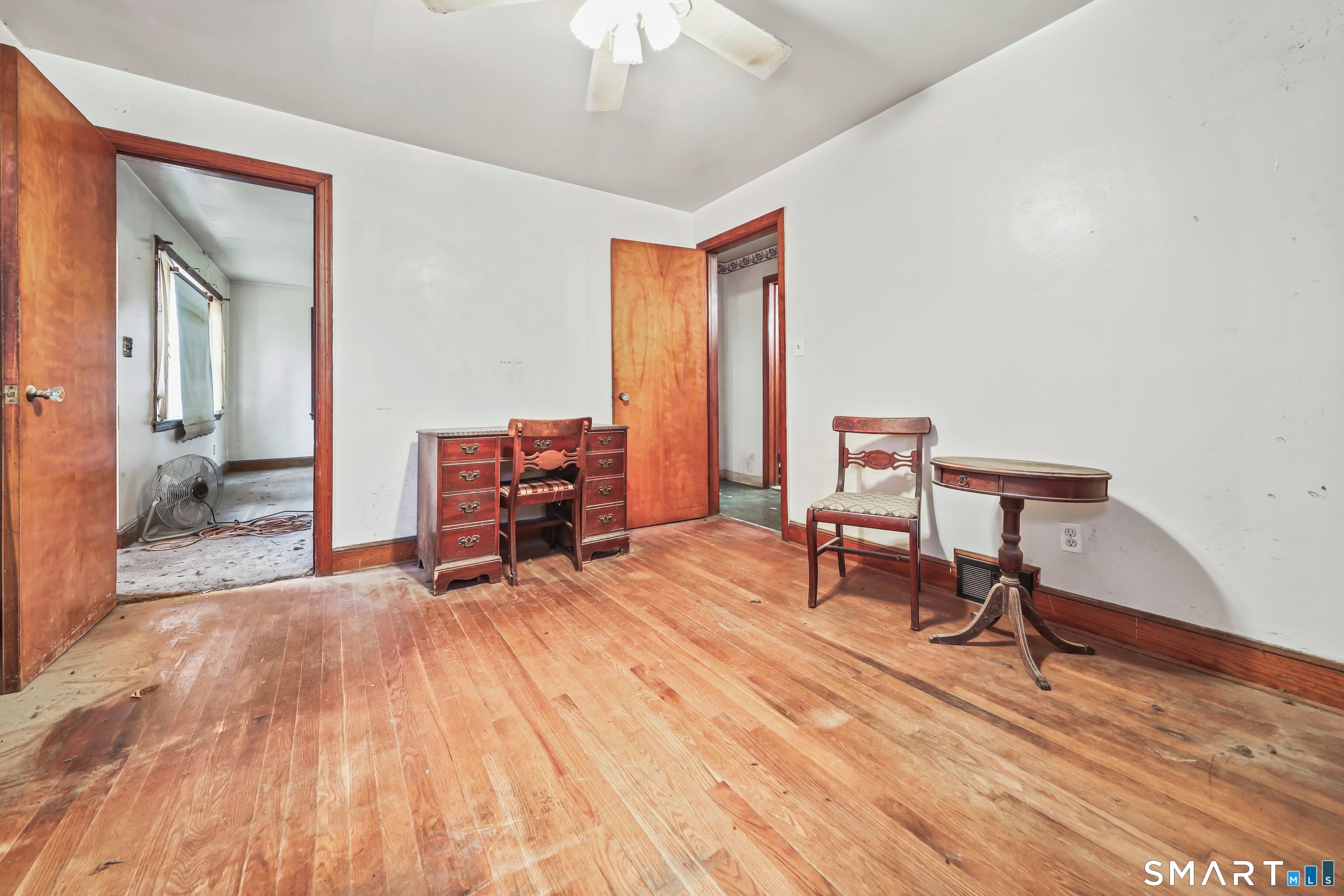 76 Clark Hill Road Prospect, CT 06712 - Photo 29 of 44 a living room with furniture and a wooden floor