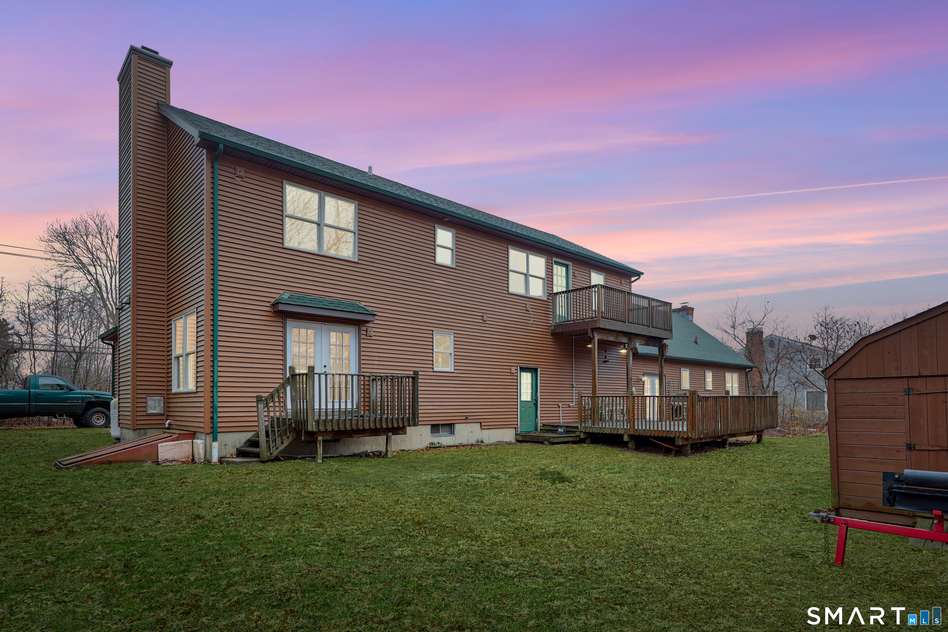 76 Clark Hill Road Prospect, CT 06712 - Photo 5 of 44 a front view of a house with a garden and yard