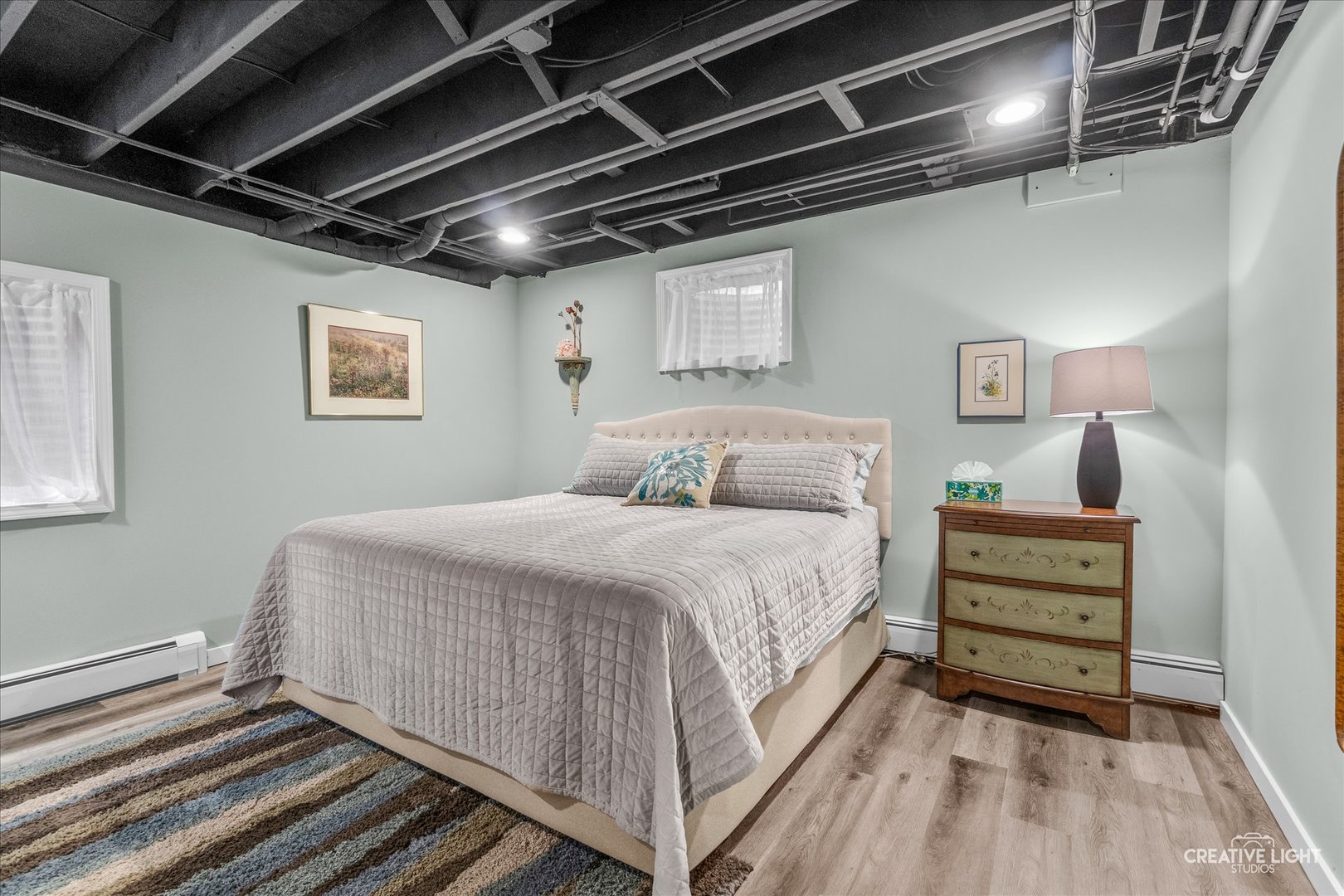 14050 Townhouse Road Newark, IL 60541 - Photo 22 of 45 a bed room with a bed and a walk in closet