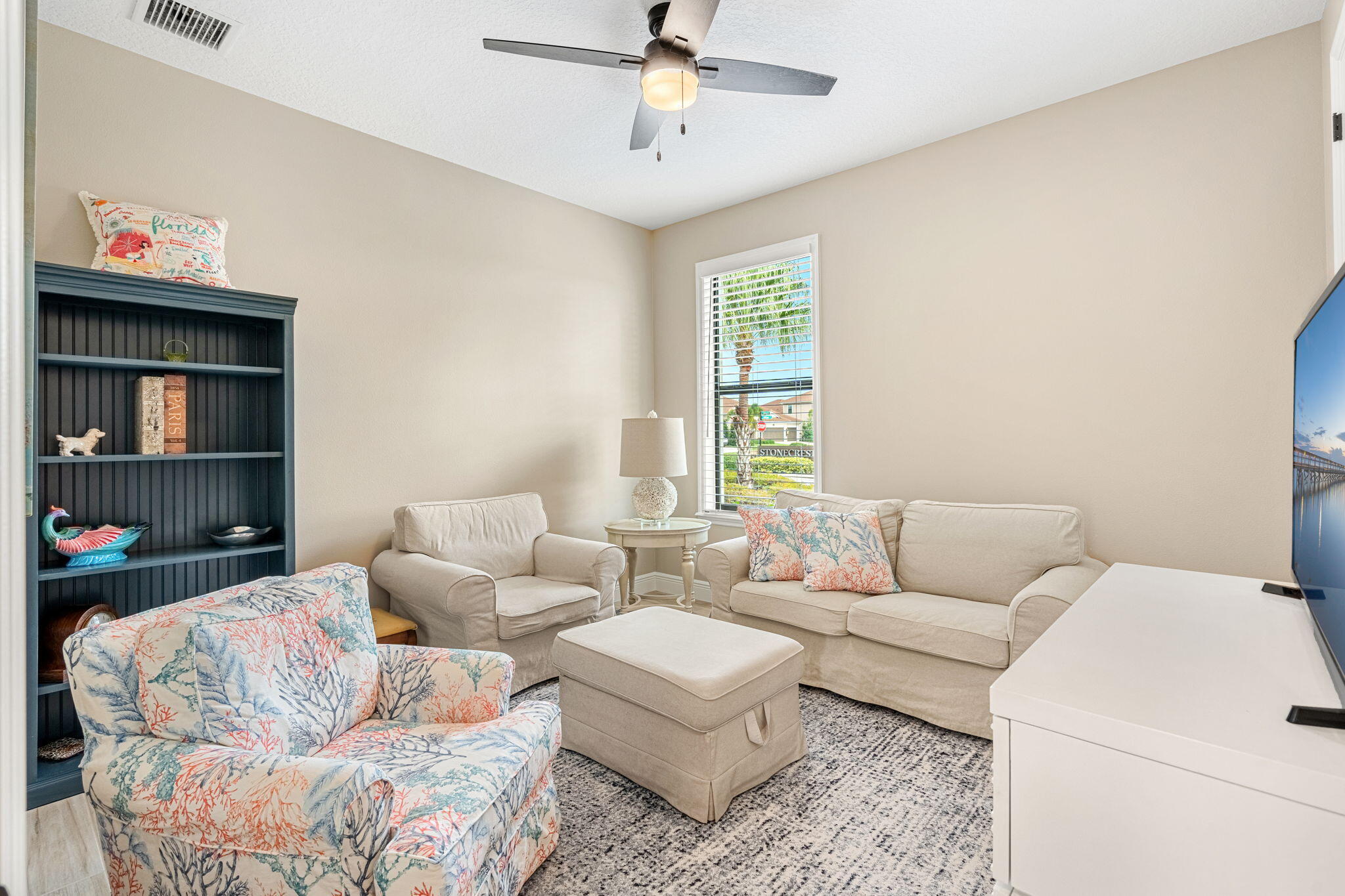 2911 Addison Drive Melbourne, FL 32940 - Photo 15 of 36 a living room with furniture and a window