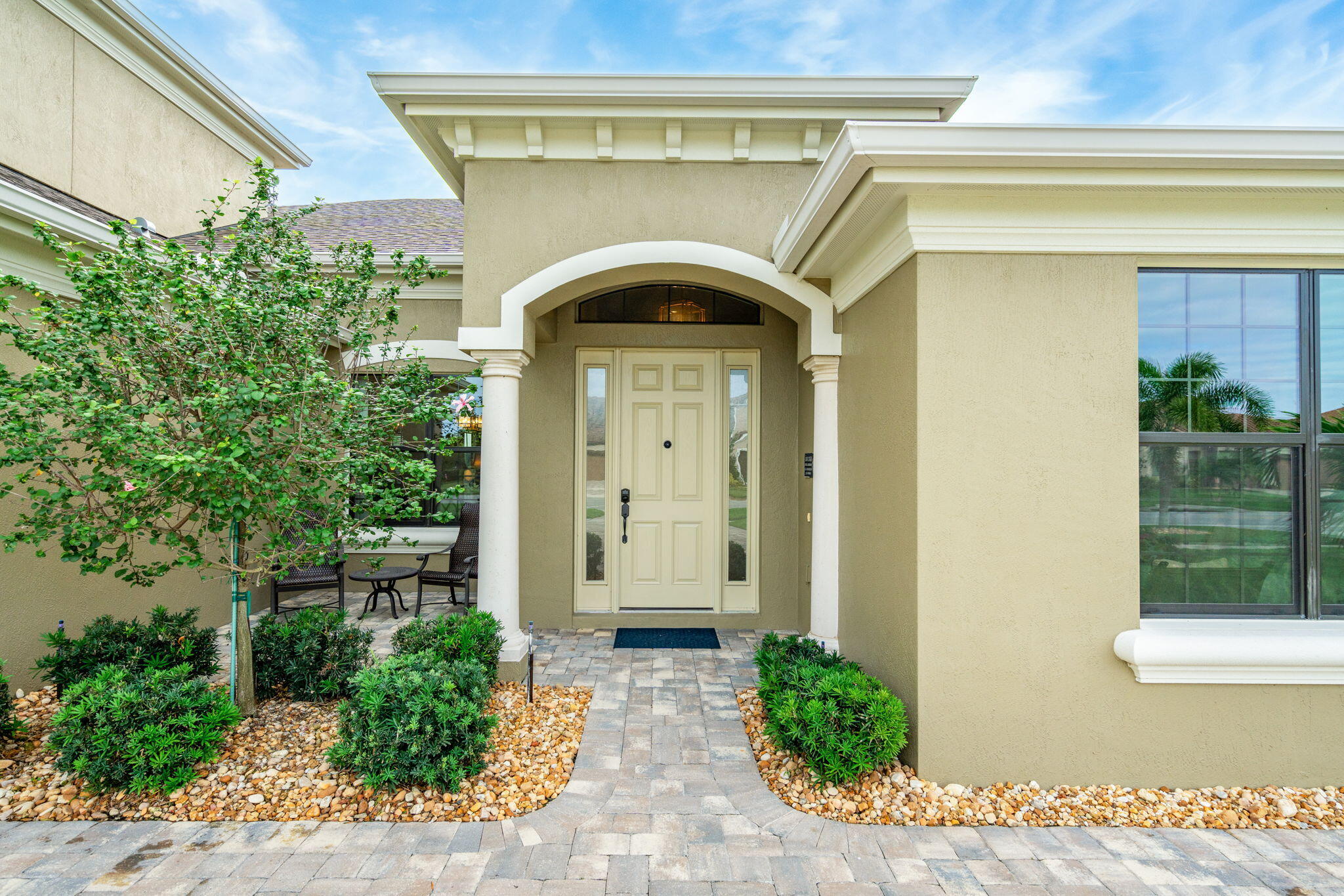 2911 Addison Drive Melbourne, FL 32940 - Photo 2 of 36 a front view of a house with a yard