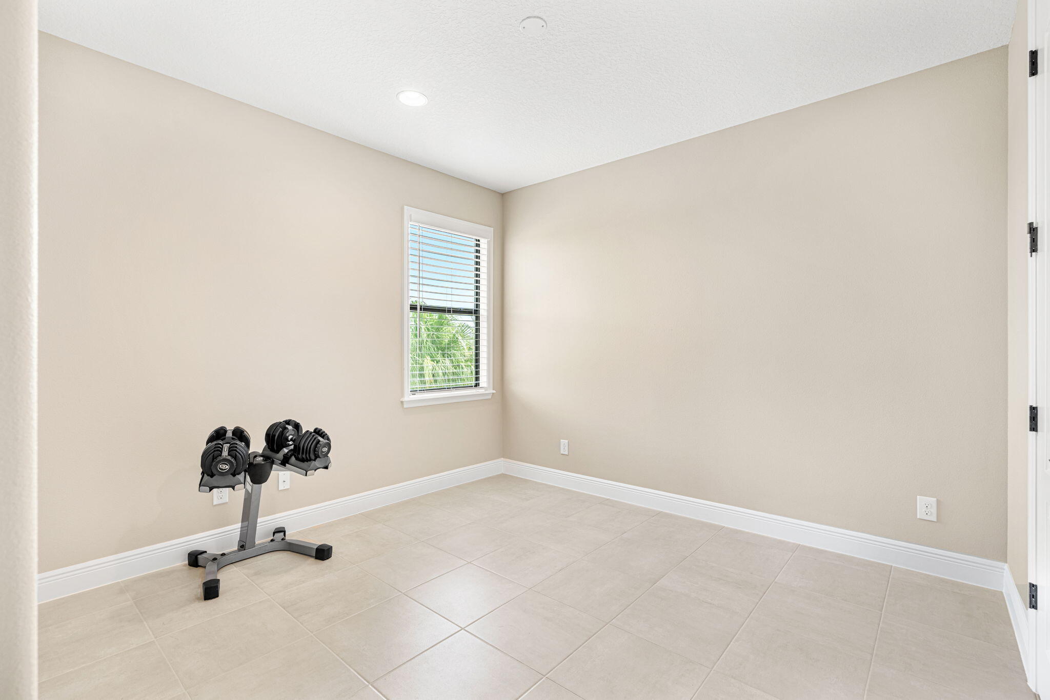 2911 Addison Drive Melbourne, FL 32940 - Photo 21 of 36 an empty room with a window
