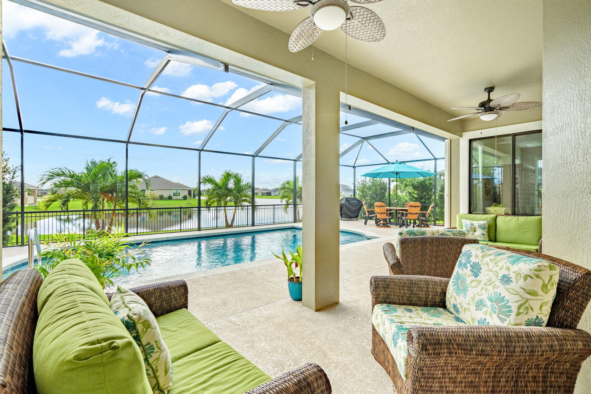 2911 Addison Drive Melbourne, FL 32940 - Photo 23 of 36 a living room with furniture and a large window