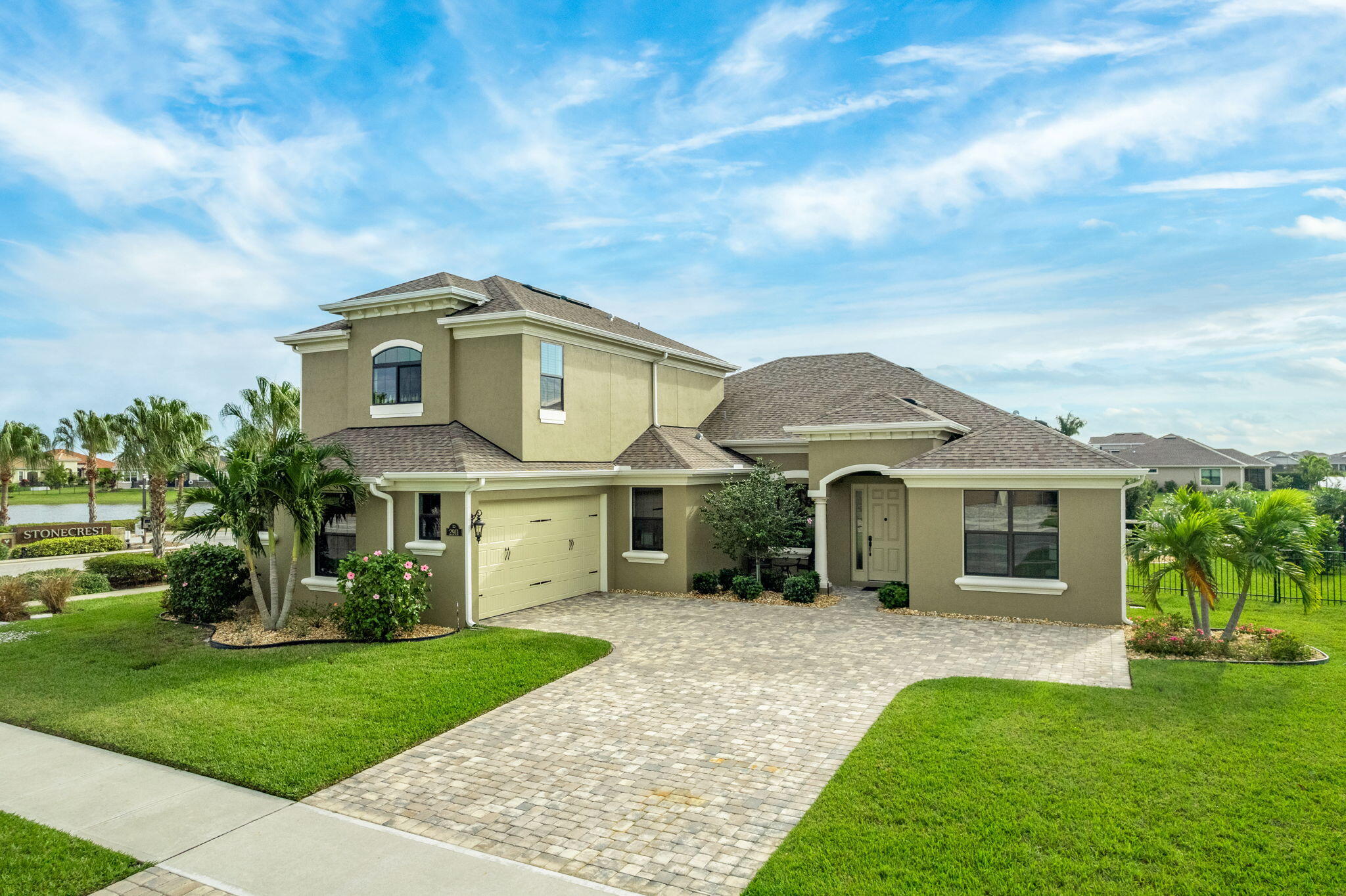 2911 Addison Drive Melbourne, FL 32940 - Photo 25 of 36 a front view of a house with a yard