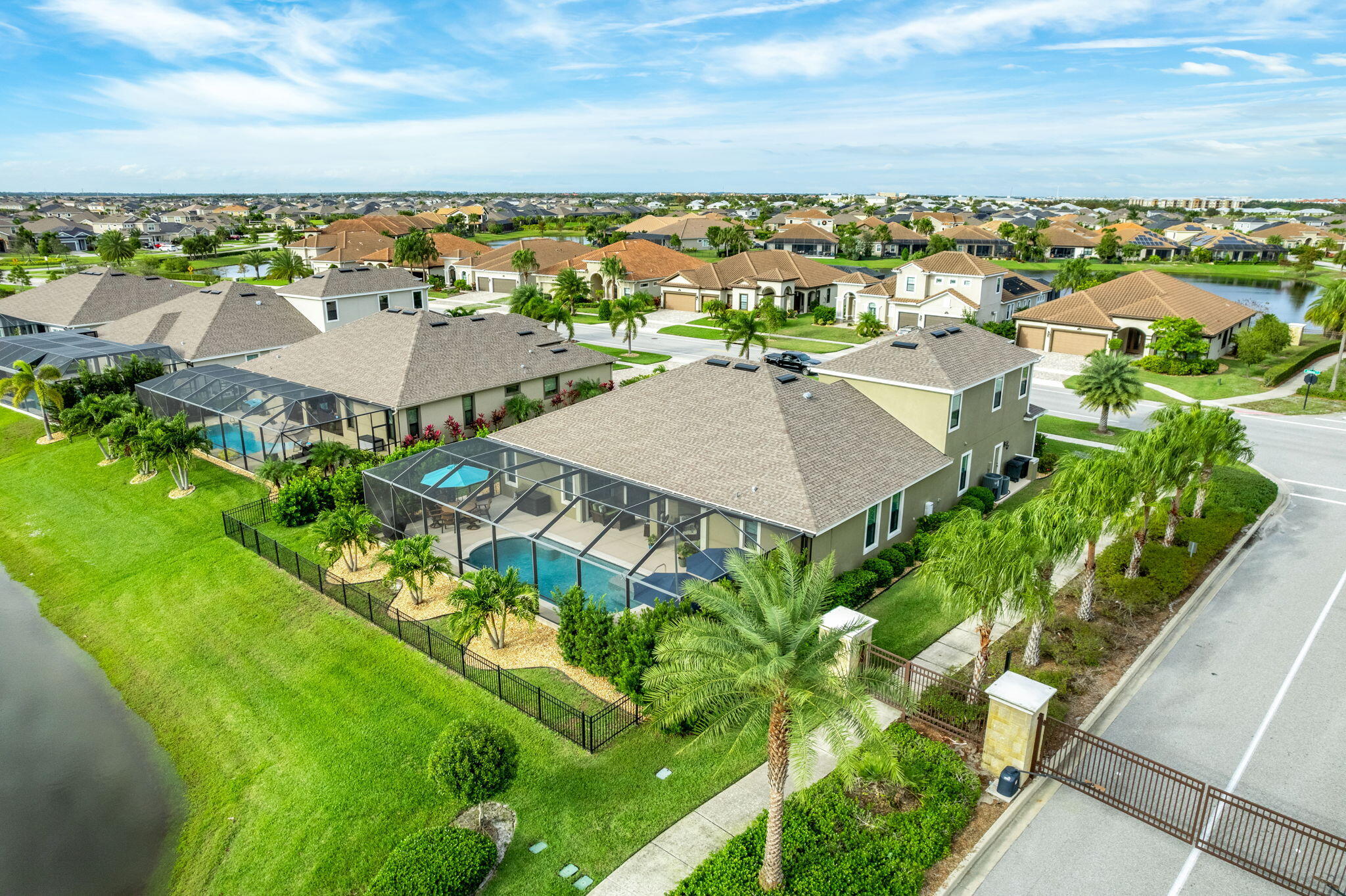2911 Addison Drive Melbourne, FL 32940 - Photo 27 of 36 an aerial view of residential houses with outdoor space and trees