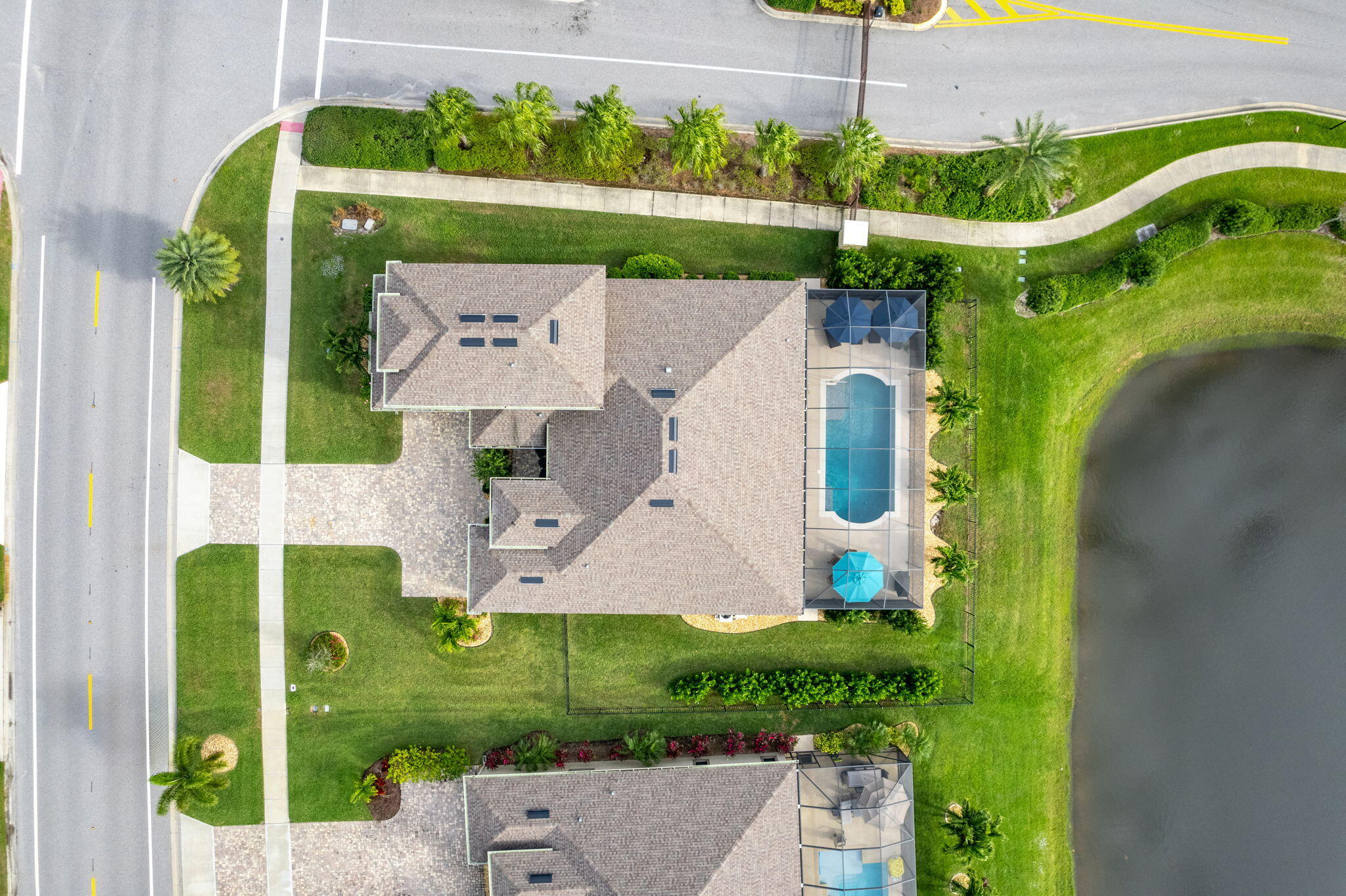 2911 Addison Drive Melbourne, FL 32940 - Photo 29 of 36 an aerial view of a house with a swimming pool