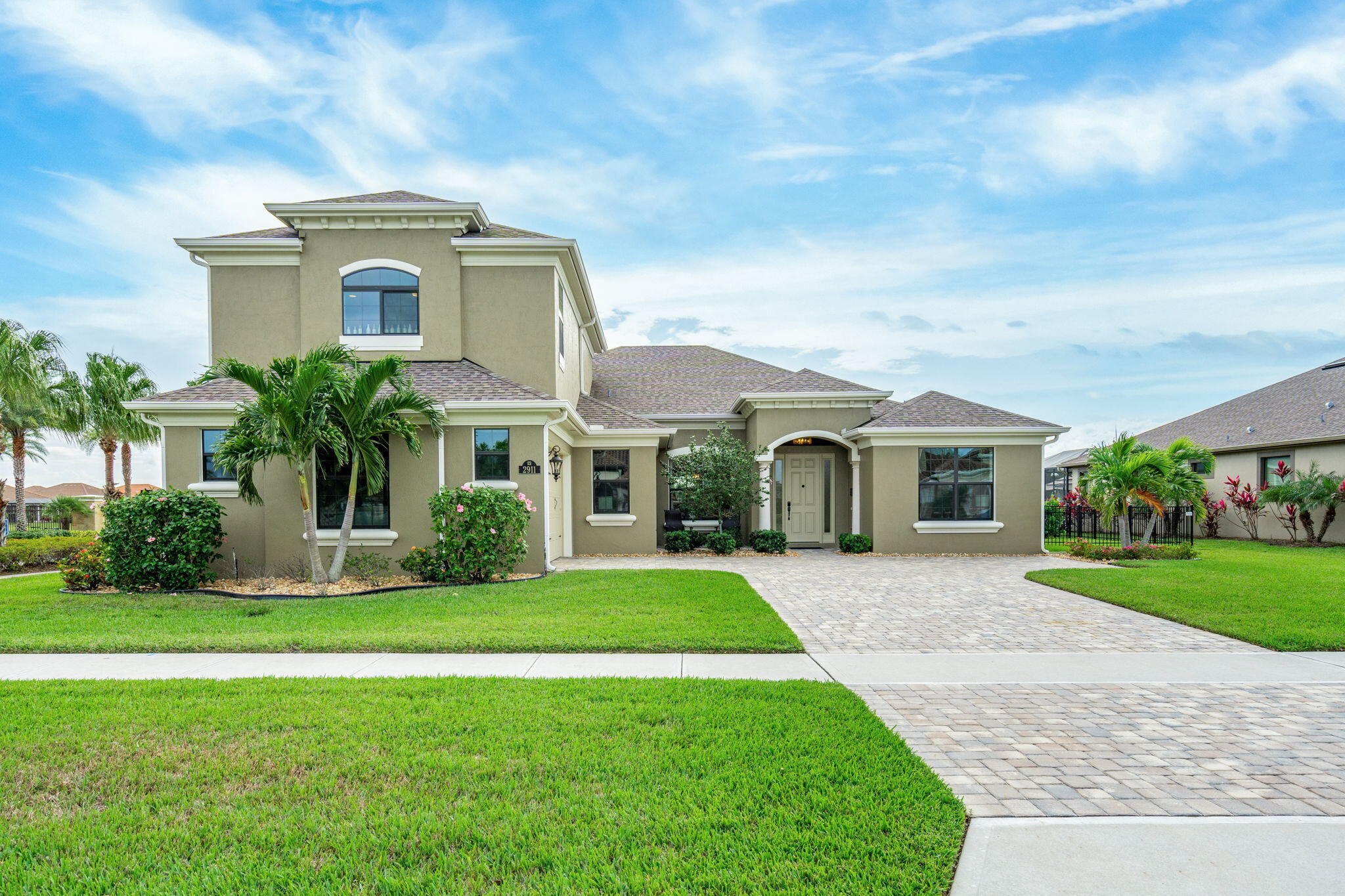 2911 Addison Drive Melbourne, FL 32940 - Photo 35 of 36 a front view of house with yard and green space