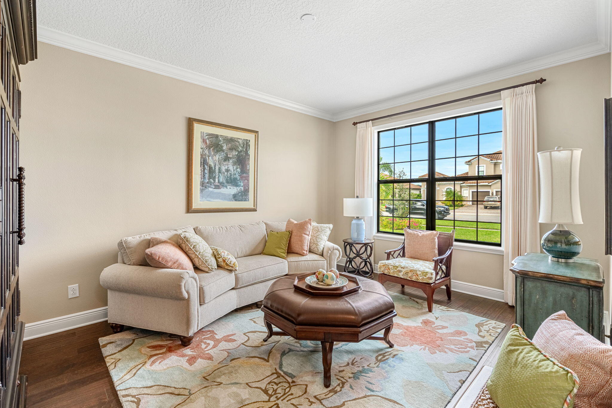 2911 Addison Drive Melbourne, FL 32940 - Photo 4 of 36 a living room with furniture and a large window