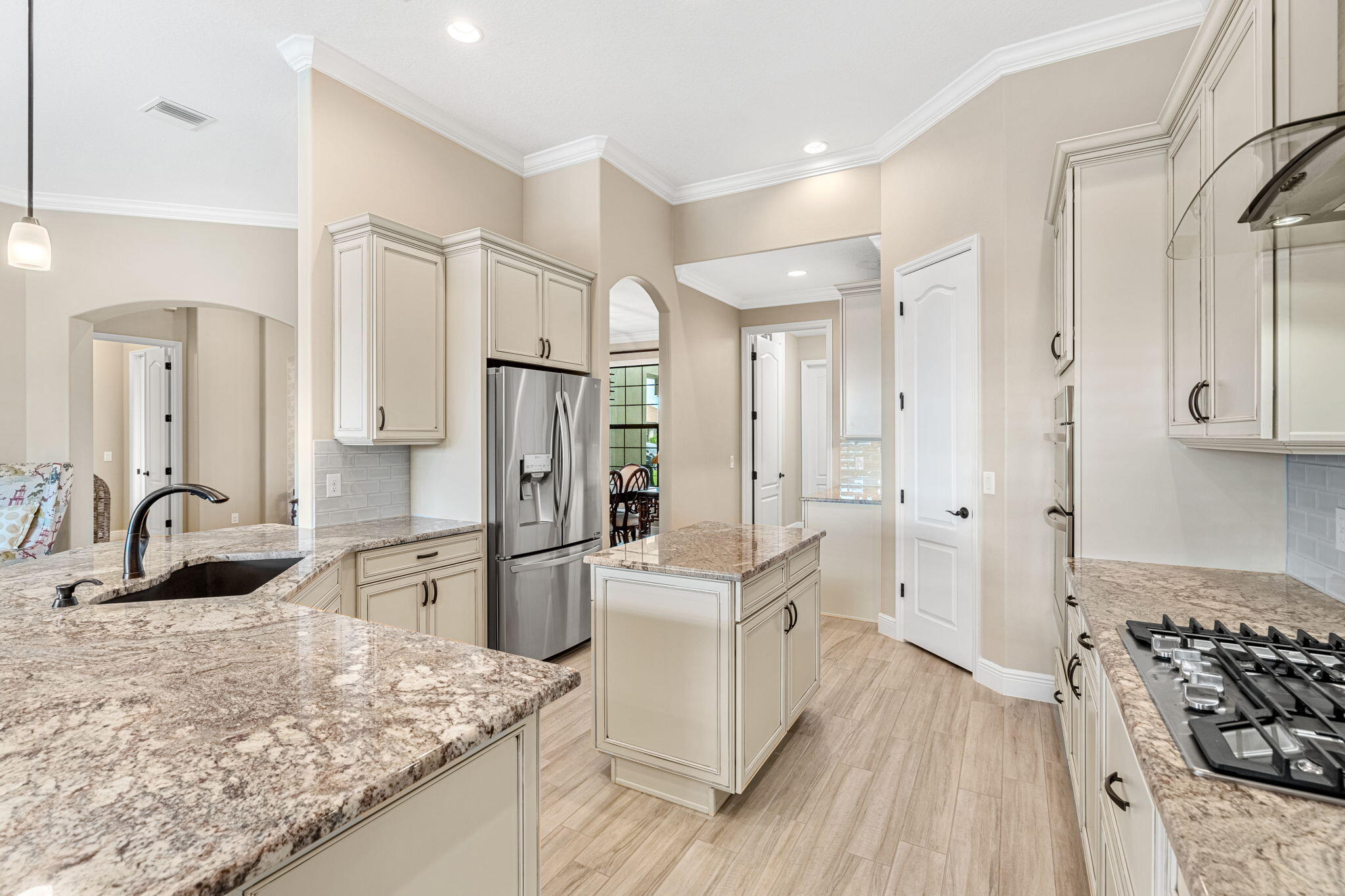 2911 Addison Drive Melbourne, FL 32940 - Photo 8 of 36 a bathroom with a granite countertop sink a toilet a mirror and shower