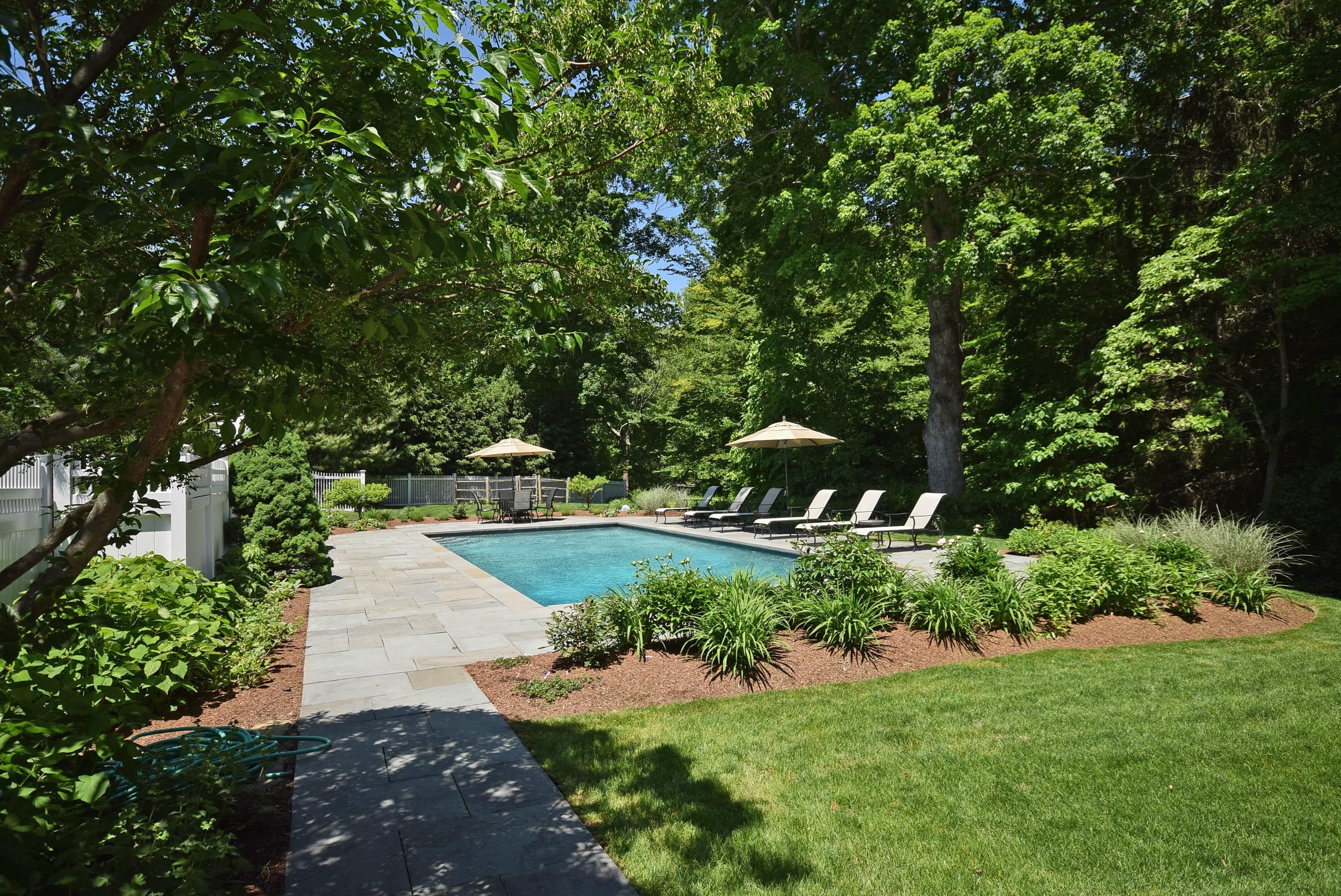879 Valley Road New Canaan, CT 06840 - Photo 20 of 26 a view of a back yard